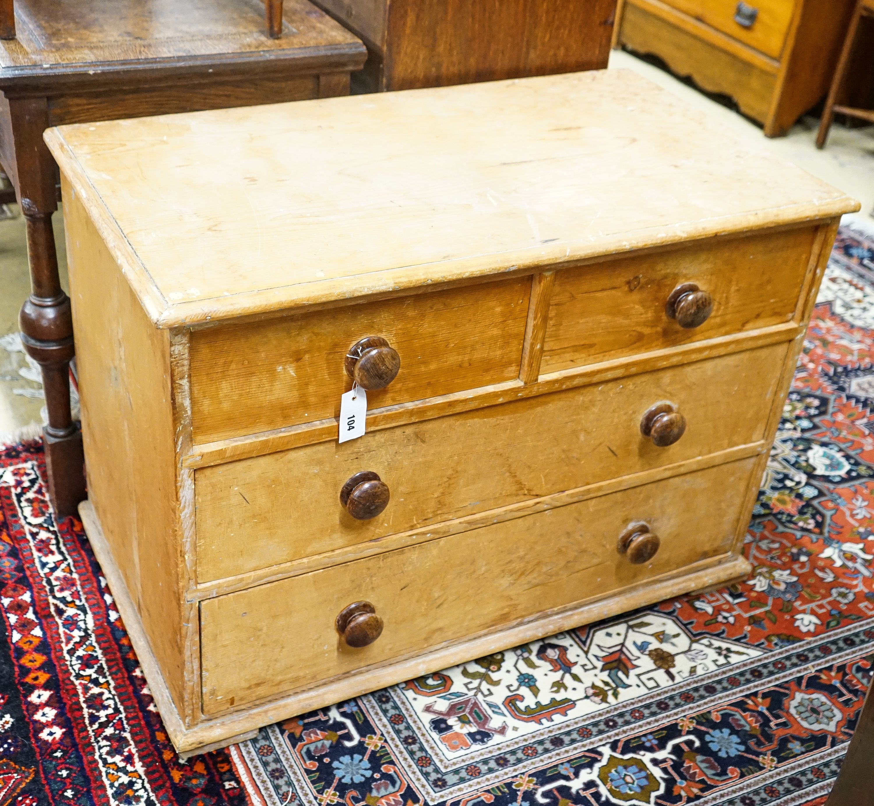 A Victorian stripped pine chest of drawers (lacking feet), width 94cm, depth 52cm, height 67cm